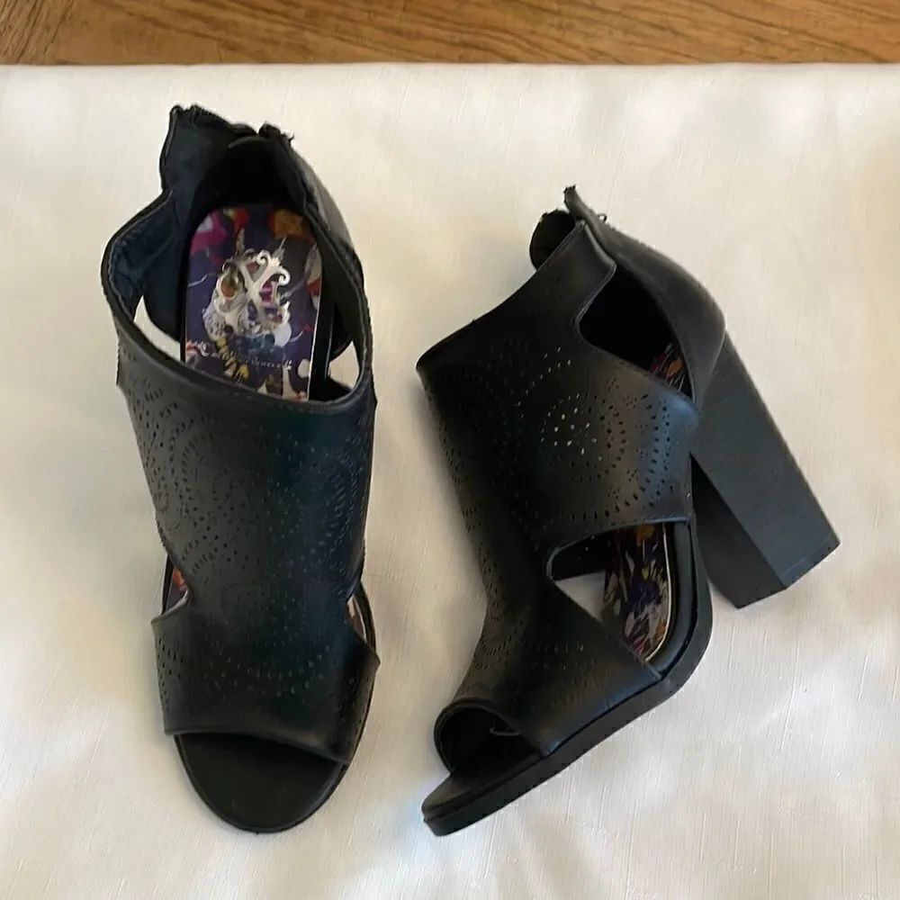 CHRISTIAN LACROIX BLACK CUTOUT SHOOTIES. NEW IN BOX